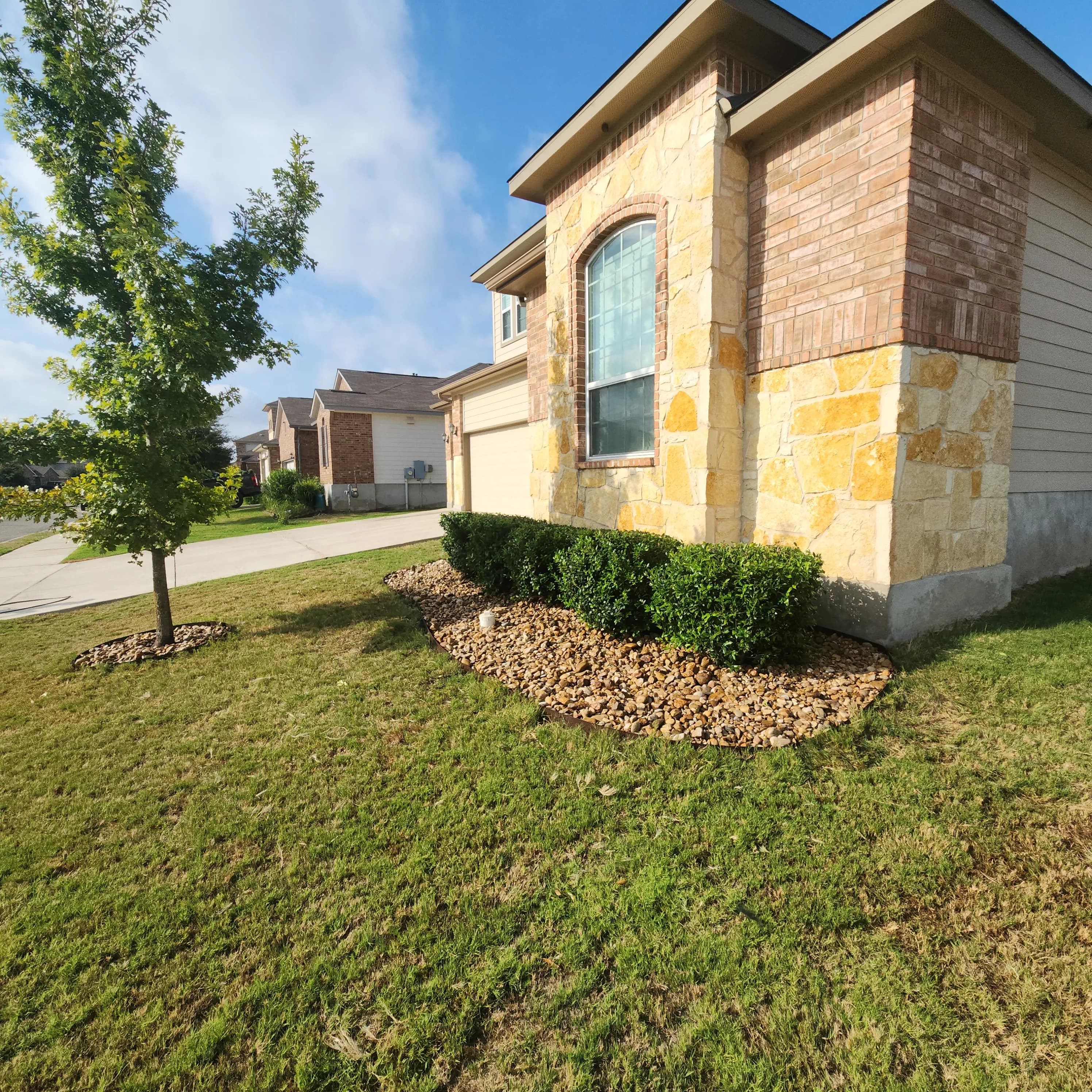 Project Front Yard Flower Bed Rebuild with TX River Rock and Steel Edging image
