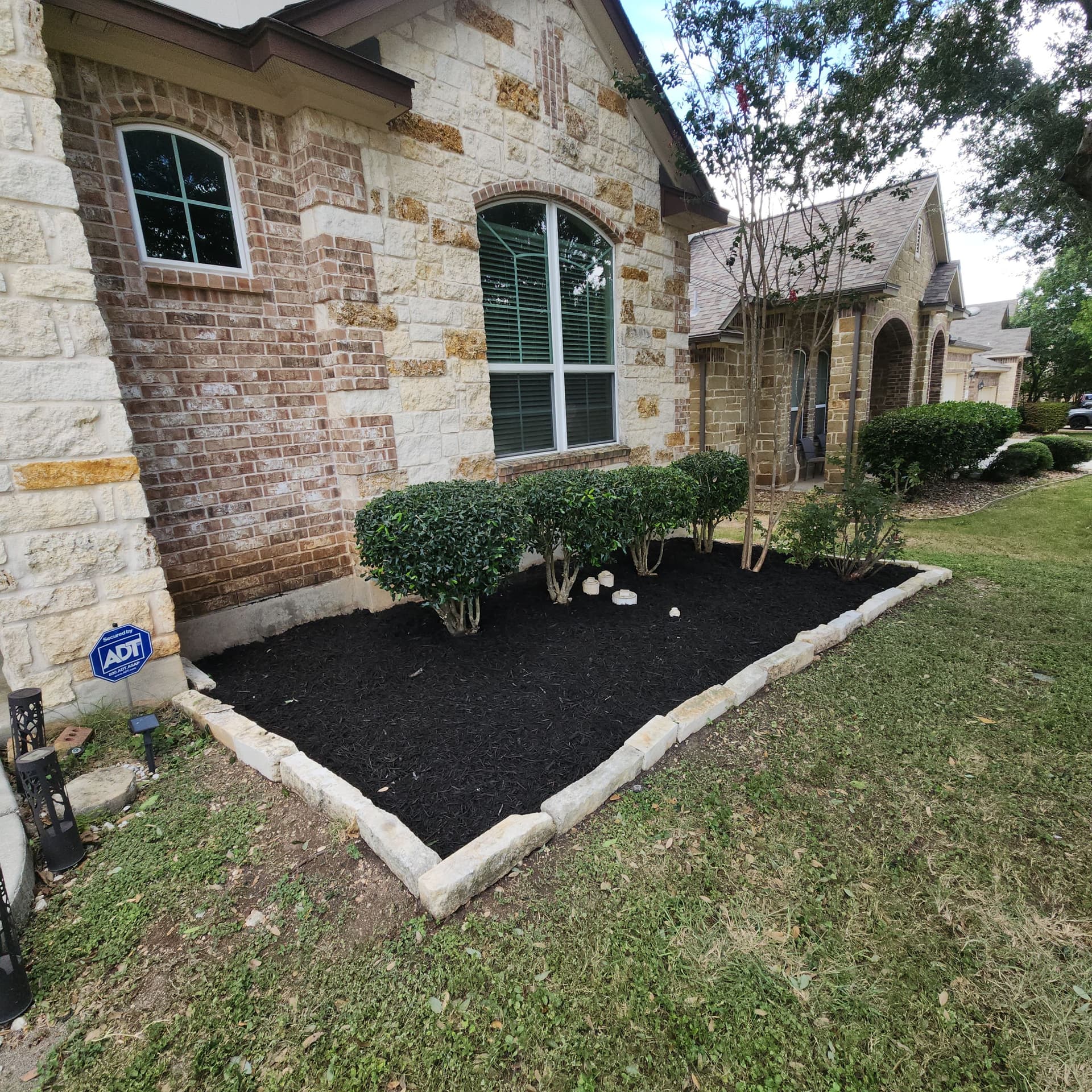 Gallery photos for Overgrown Front Beds Get a Fresh Start With Black Mulch: Image #2